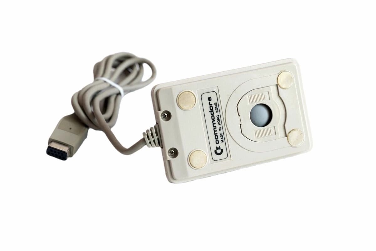 Commodore 1351 mouse, bottom view with ball mechanism visible