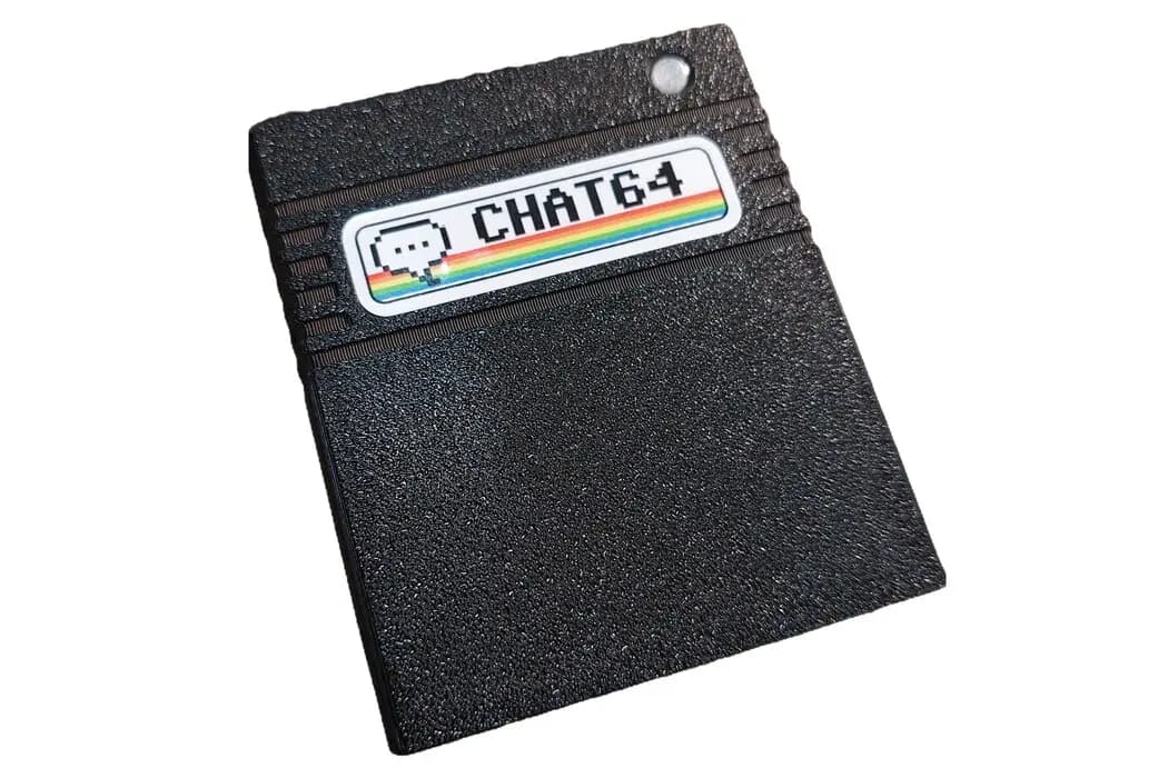 Chat64 WiFi cartridge plugged into a Commodore 64, enabling internet connectivity on original 1980s hardware in 2024