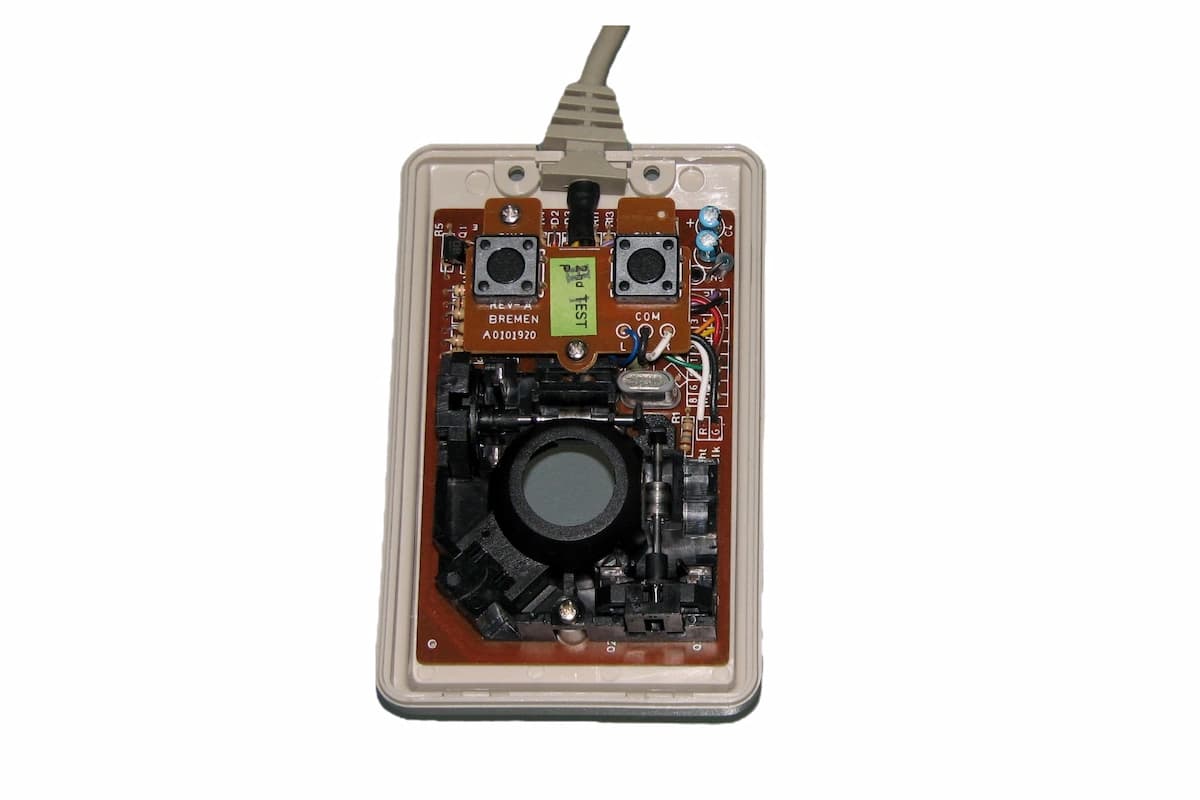 Commodore 1351 mouse opened, showing the internal circuit board