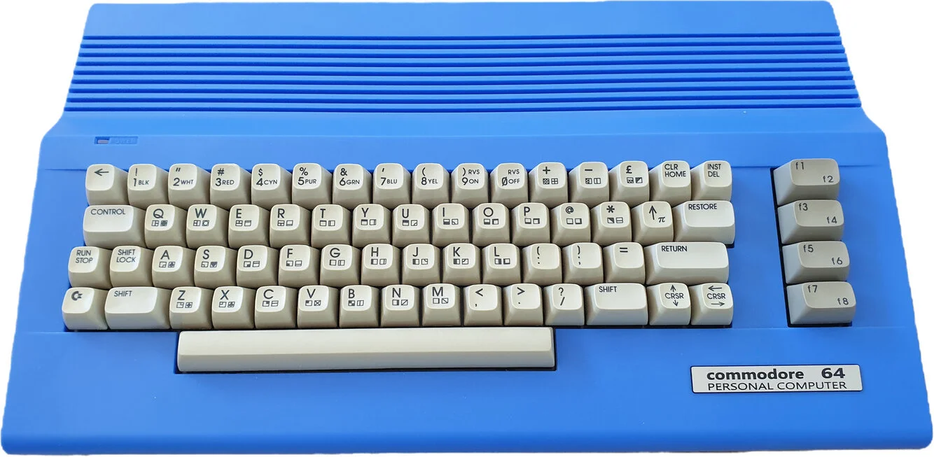 Commodore 64C showing the flat angular case design that matched the Amiga 500 aesthetic