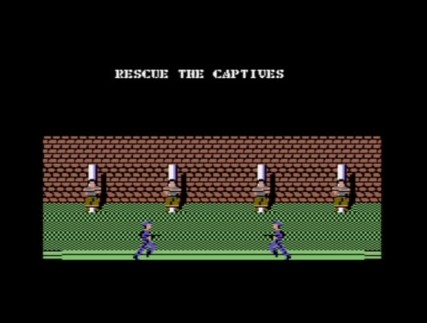 Green Beret C64 — the beginning of the game, captives awaiting rescue at the prisoner-of-war camp